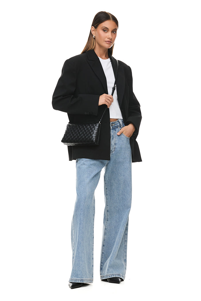 THE COURTNEY BLACK CROSSBODY BAG | model