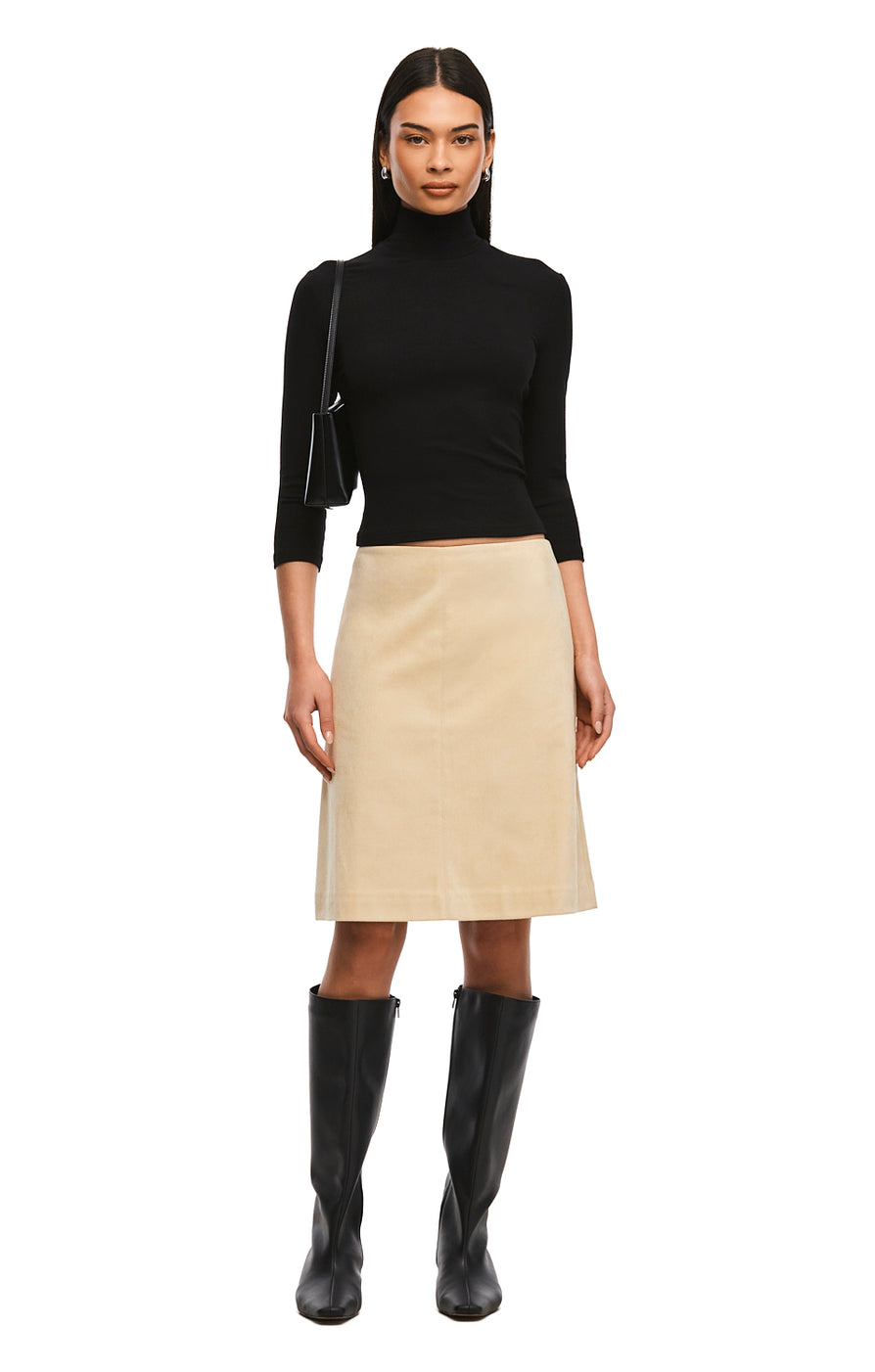 THE NICOLE BEIGE MIDI SKIRT | model